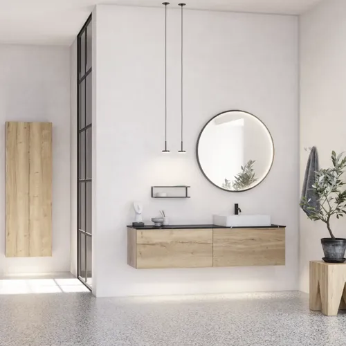 Großes urbanes Badezimmer mit Möbeln aus Eichenholz, Steinplatte mit quadratischem Becken, rundem Spiegel mit schwarzem Rand, Naturfarben und Terrakottaboden für einen industriellen und modernen Look